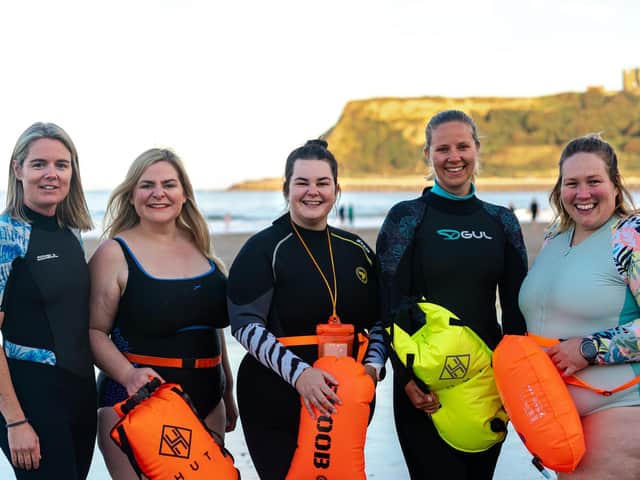 Pre swim, from left, Amy Tamblin, Diane Tricker, Sam Weighell, Louise Parkin, Roxanne Woolcott (Erik Woolcott)
