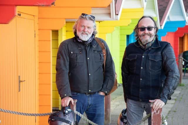 The Hairy Bikers Si King and Dave Myers take in the sights of Scarborough's North Bay outside the colourful beach chalets. (Photo: Jon Boast/BBC/South Shore Productions)