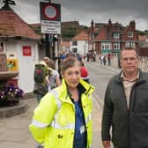 Highways Improvement Manager Helen Watson and County Councillor Joe Plant
with the backdrop of Whitby Swing Bridge.