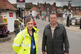 Highways Improvement Manager Helen Watson and County Councillor Joe Plant
with the backdrop of Whitby Swing Bridge.
