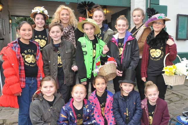 S.P.O.T.S performers from the Spotlight Youth Theatre are pictured at Bridlington Old Town Dickensian Festival 2013. (msh1348x416)