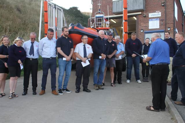 Father Tony Wilson presented cheques to Flamborough RNLI, Flamborough Pre School and Yorkshire Air Ambulance following a special service and blessing of the Flamborough Lifeboat. Photo courtesy of Flamborough RNLI.Father Tony Wilson presented cheques to Flamborough RNLI, Flamborough Pre School and Yorkshire Air Ambulance following a special service and blessing of the Flamborough Lifeboat. Photo courtesy of Flamborough RNLI.