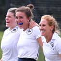 Lisette Vincent Jones (left) with Whitby scorer Anna Sweeney and Nichola Kent (right)

PHOTO BY BRIAN MURFIELD