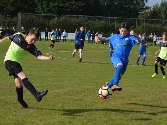 Heslerton U13s in action against Hunmanby
Photos by Cherie Allardice
