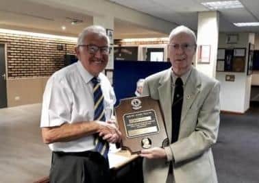 Lion John Hall presents the Melvyn Jones Fellowship to David Baker.Lion John Hall presents the Melvyn Jones Fellowship to David Baker.