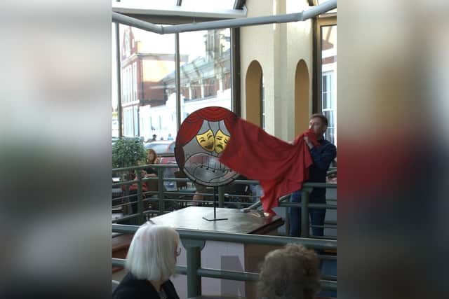 The new stained glass memorial at Whitby Pavilion is unveiled by Jordan Butler.