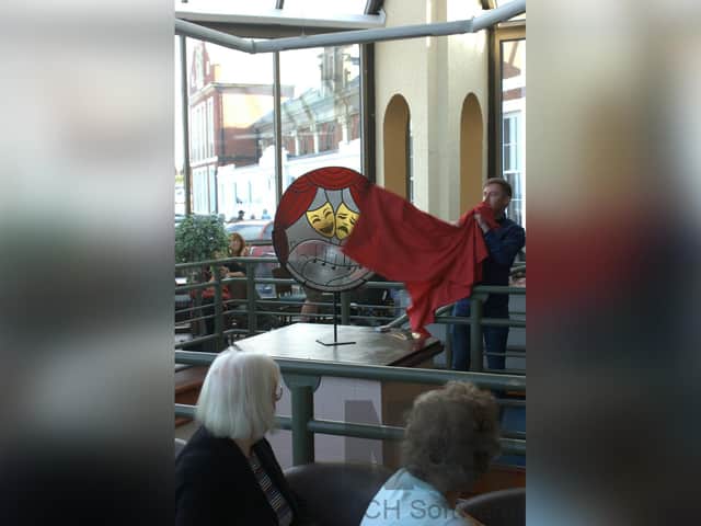 The new stained glass memorial at Whitby Pavilion is unveiled by Jordan Butler.