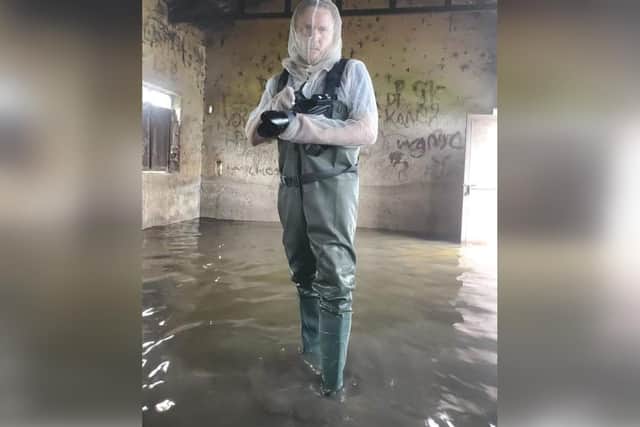 Peter in his waders and mosquito nets as he documents the floods in South Sudan. (Photo: Peter Caton)