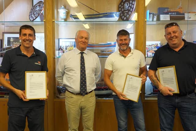 RNLI Chief Executive Mark Dowie presents L-R: Richard Dowson, Matt Sharpe and Ian Taylor with their framed letters of thanks. - Picture credit: 
RNLI/Leah Hunter