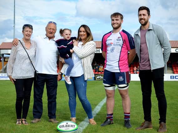 The Scarborough RUFC v Morley matchday mascot Mollie Sill with mum Elisha, on the right are Scarborough RUFC captain Drew Govier, and Mollie’s dad Matthew, with Matthew’s parents Dave and Jackie on the left
