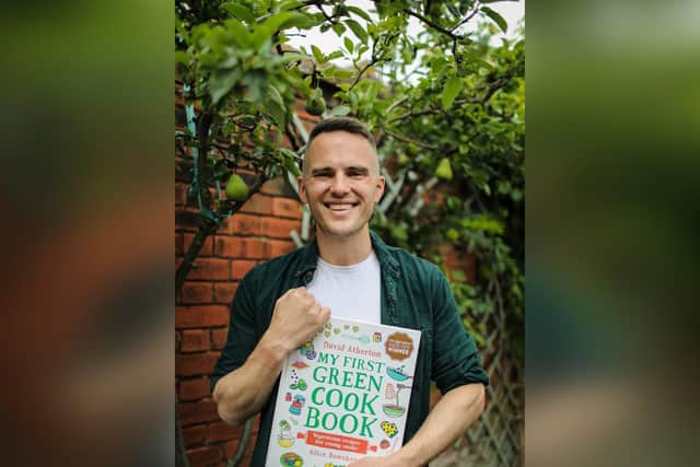 Whitby's David Atherton with a copy of My First Green Cook Book.