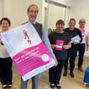 John Smith, chief executive of HEY Credit Union, and some of his colleagues celebrate their success at the Consumer Credit Awards 2021.