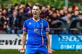 Man of the match Liam Cooke celebrates his goal

Photo by Brian Murfield