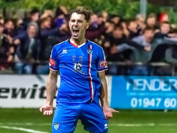Man of the match Liam Cooke celebrates his goal
Photo by Brian Murfield