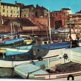 This postcard shows Bridlington Harbour in the 1960s.
