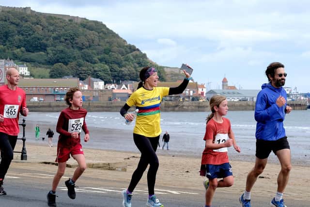 The women's winner of the McCain Yorkshire Coast 10K Rhona Marshall, centre, in Fun Run action
Photo by Richard Ponter