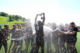 Angel celebrate their NRCFA Cup 4-1 final win against Traf in May