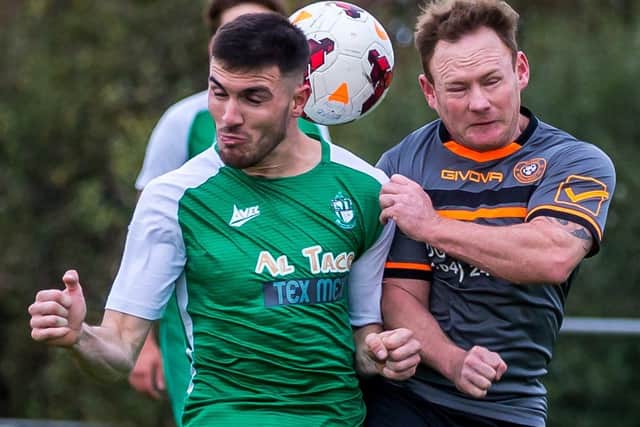 Fishburn Park (green kit) battle it out with Redcar Newmarket
Photo by Brian Murfield