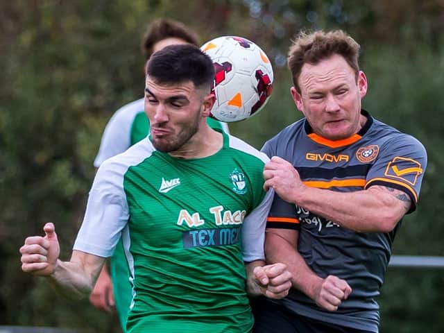 Fishburn Park (green kit) battle it out with Redcar Newmarket
Photo by Brian Murfield