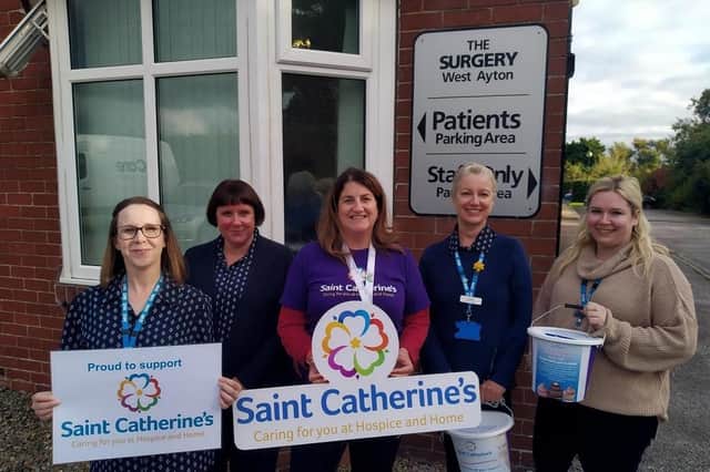 Photo of the team at Ayton and Snainton Medical Practice, pictured with Tracy Calcraft, fundraising and marketing director at Saint Catherine’s.