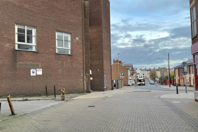 The 66-year-old victim was left on the floor outside the NCP car park on North Street with a broken thigh bone.