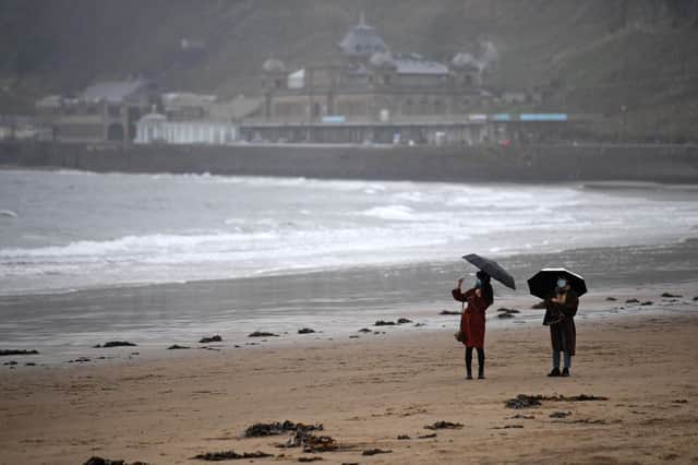 A wet and windy weekend has been forecast for Scarborough this weekend. (Photo by Oli SCARFF / AFP) (Photo by OLI SCARFF/AFP via Getty Images)