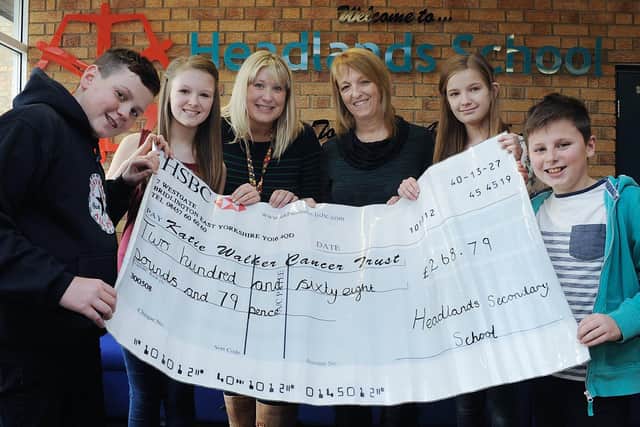 Headlands School’s cheque presentation of £268.79 to the Katie Walker Cancer Trust in 2014 following a Christmas fundraiser. (NBFP PA1407-8)
