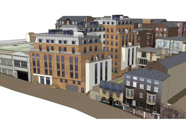The proposal for the 47-apartment block, between the multi-storey car park (to the left) and The Hole in the Wall pub, on land that was once the United bus depot.
