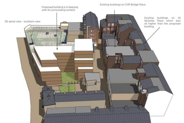 Developers say the eight-storey building has been designed to match the height of surrounding buildings.