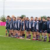 Scarborough RUFC players observe a minute's silence for ex-club president and players Norman Hopkin and Geoff Hill