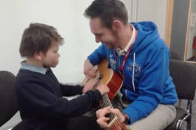 Charlie Harrison is pictured with Mark Howley (Remakable Arts). Photo submitted