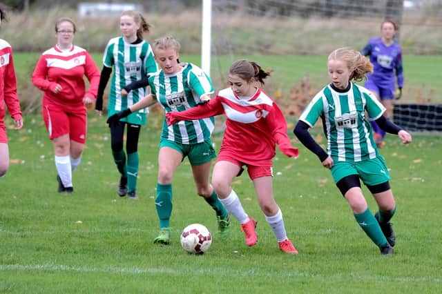 Teo Baltatu on the ball for Scarborough Ladies U14s against Wigginton