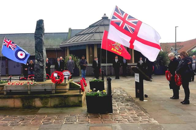 Remembrance service at Dock End, Whitby, last year. Picture by Alan Wastell.