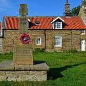 The war memorial at Goathland has been newly listed at Grade II.