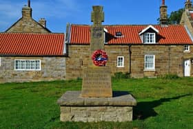 The war memorial at Goathland has been newly listed at Grade II.
