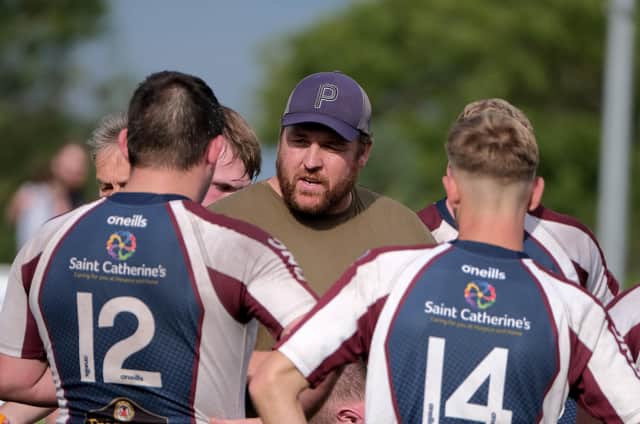 Matty Jones talks to his Scarborough RUFC players at half-time