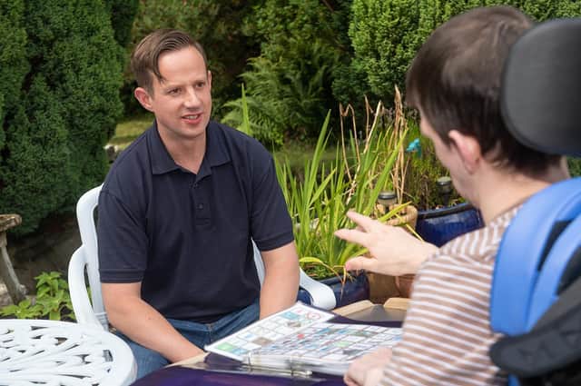 Michael Westlund in conversation in the garden at Milestone House