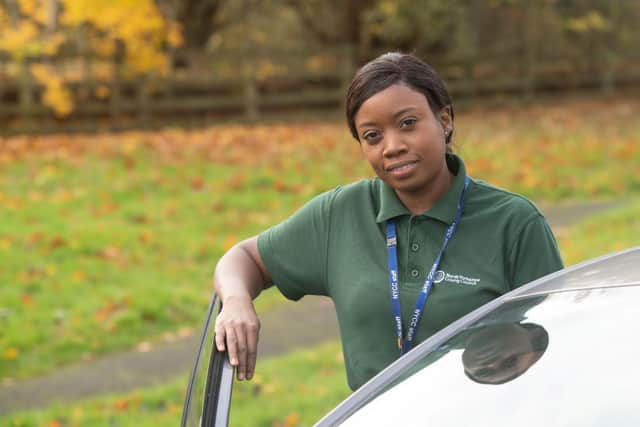 Flavia Nyambira about to set out on her care work