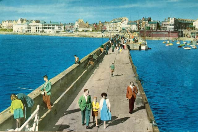 This colourful south pier postcard is clearly date stamped  October 2, 1963.
