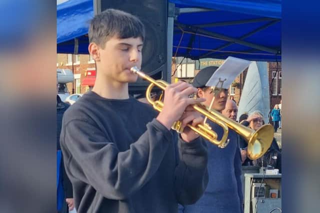 Daniel Hatchwell Shone plays The Last Post at Whitby's Remembrance service on Sunday, at Dock End.