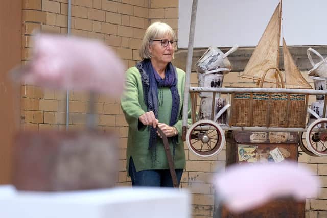 Sally Gorman with the Wish You Were Here sculpture by Victoria Ferrand Scott at the Old Parcels Office at Scarborough Railway Station