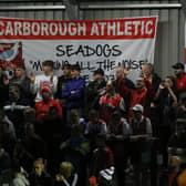 Scarborough Athletic fans cheer their team on at the Flamingo Land Stadium.