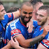 Whitby Town scorer Jacob Hazel, centre, hit a hat-trick in last weekend's 5-0 FA Trophy win against Mossley.