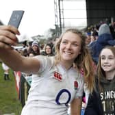 Zoe Aldcroft of England interacts with fans after the Women's Six Nations match between England and Wales at Twickenham Stoop.