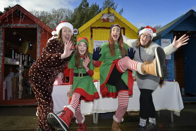 Stallholders get into the Christmas spirit at the Sparkle event in 2019.