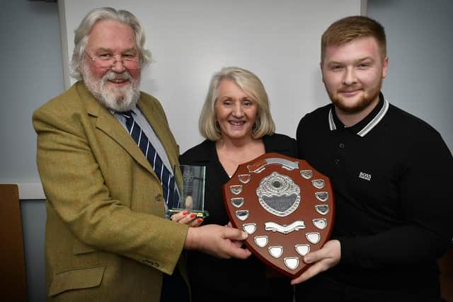 Malcolm Lockey and chairman of Whitby Fishing School, Anne Hornigold, present Ben Morris with the Tony Hornigold Endeavour award.
215014c