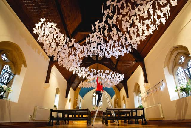 The 2,000 angels hanging from the ceiling at St Mary's Church, Sandsend, ready to be blessed by the Archdeacon of Cleveland.
picture: Ceri Oakes.