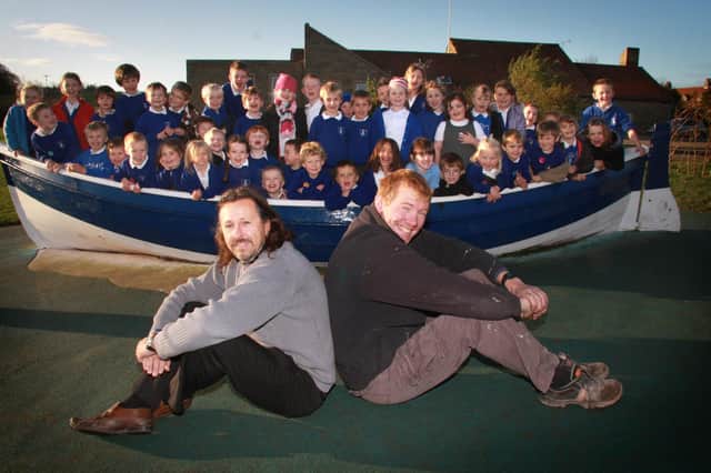 Geoff Delve and Gary Chadfield who both helped restore Lythe School’s boat free of charge.