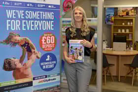 Pebble Shore Travel owner Rachel Dartnall-Smith outside the new shop in Scarborough Market Hall.