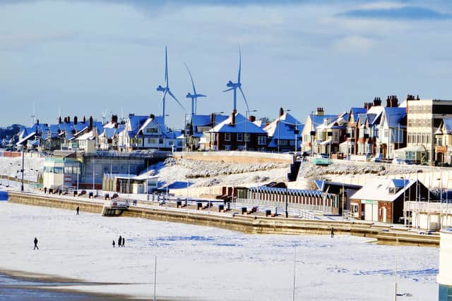 Aled Jones focuses on the snow-covered beach for this wonderful winter shot.